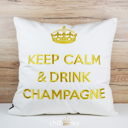 Weißes Gartenkissen mit goldeber Krone und KEEP CALM & DRINK CHAMPAGNE bestickt für Balkon, Garten und Poolhaus