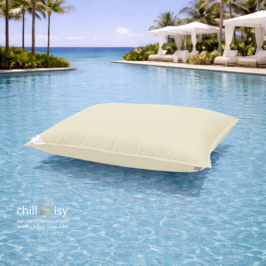 Premium Poolkissen Maxi 190x130 cm von chillisy in Canvas im Pool mit Meeranschluss treibend.