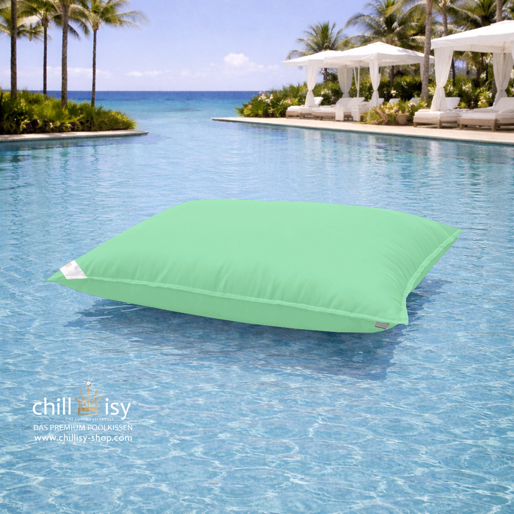Premium Poolkissen Maxi 190x130 cm von chillisy in Lindenbaum Grün im Pool mit Meeranschluss treibend.